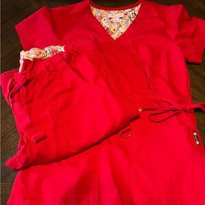 Red Koi scrub set in small, pants are tall